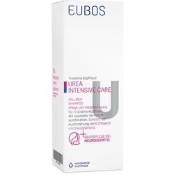 Weiße Shampoo-Verpackung für trockene Kopfhaut mit rosa und grauem Text.